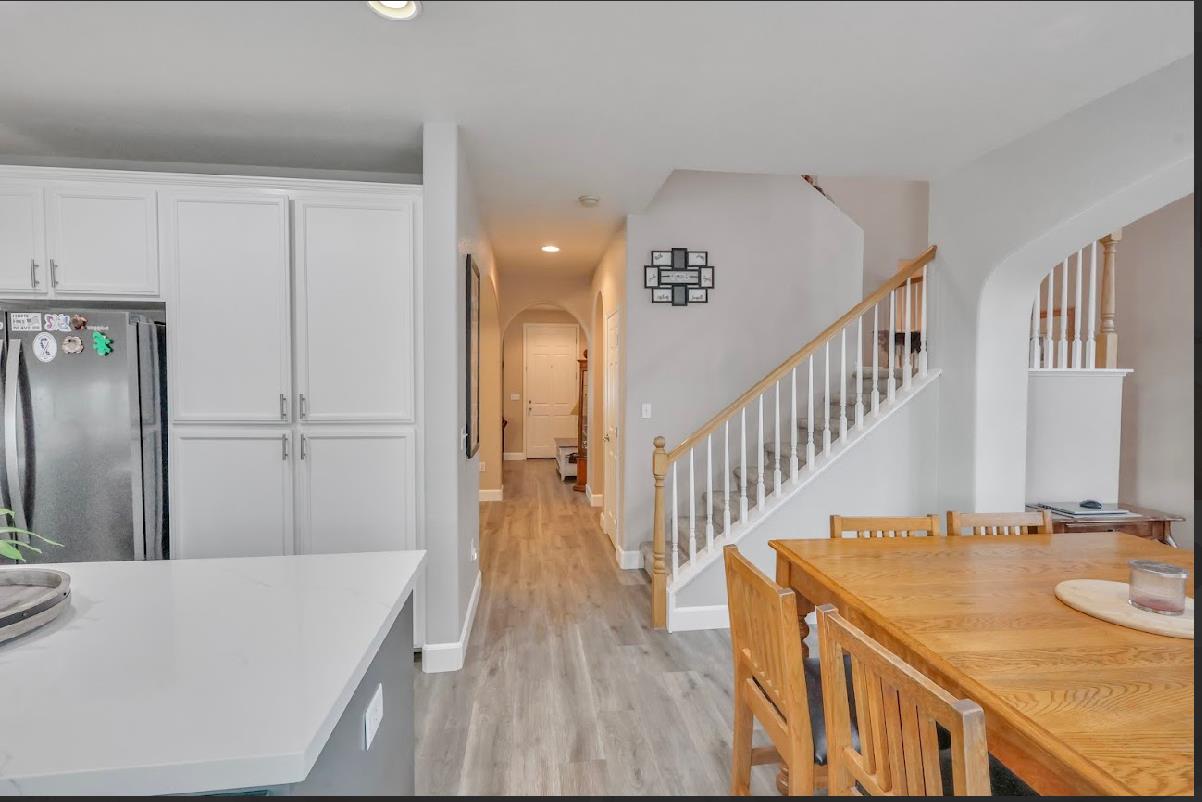 10647 Spring Creek Place Stockton, CA 95209 - Photo 9 of 24 a view of a kitchen from the hallway