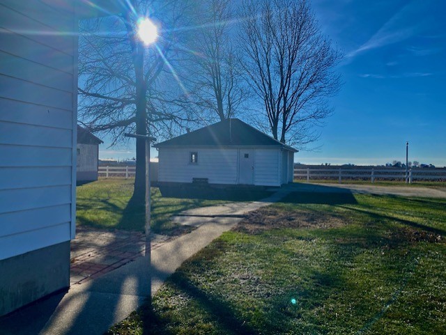 312 Walnut Street Leonore, IL 61332 - Photo 4 of 13 a backyard of a house with lots of green space