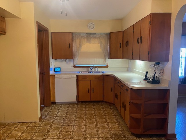 312 Walnut Street Leonore, IL 61332 - Photo 7 of 13 a utility room with a sink a washer and dryer