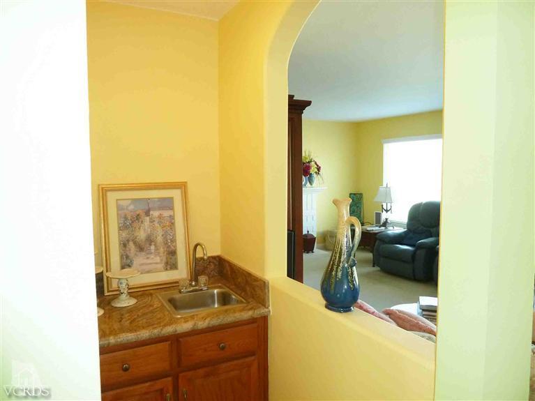 13715 Gunsmoke Road Moorpark, CA 93021 - Photo 22 of 57 a en suite bathroom with a granite countertop sink and a mirror