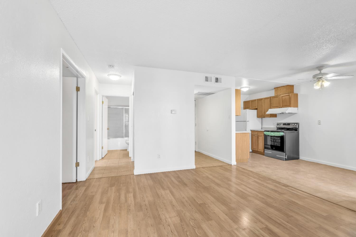 4332 Pacific Avenue, Unit 25 Stockton, CA 95207 - Photo 15 of 38 a view of a kitchen with a sink and a refrigerator
