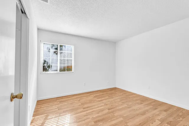 a view of empty room with windows