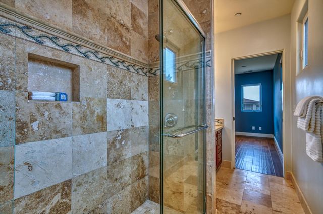 a view of a chairs and table in the garden