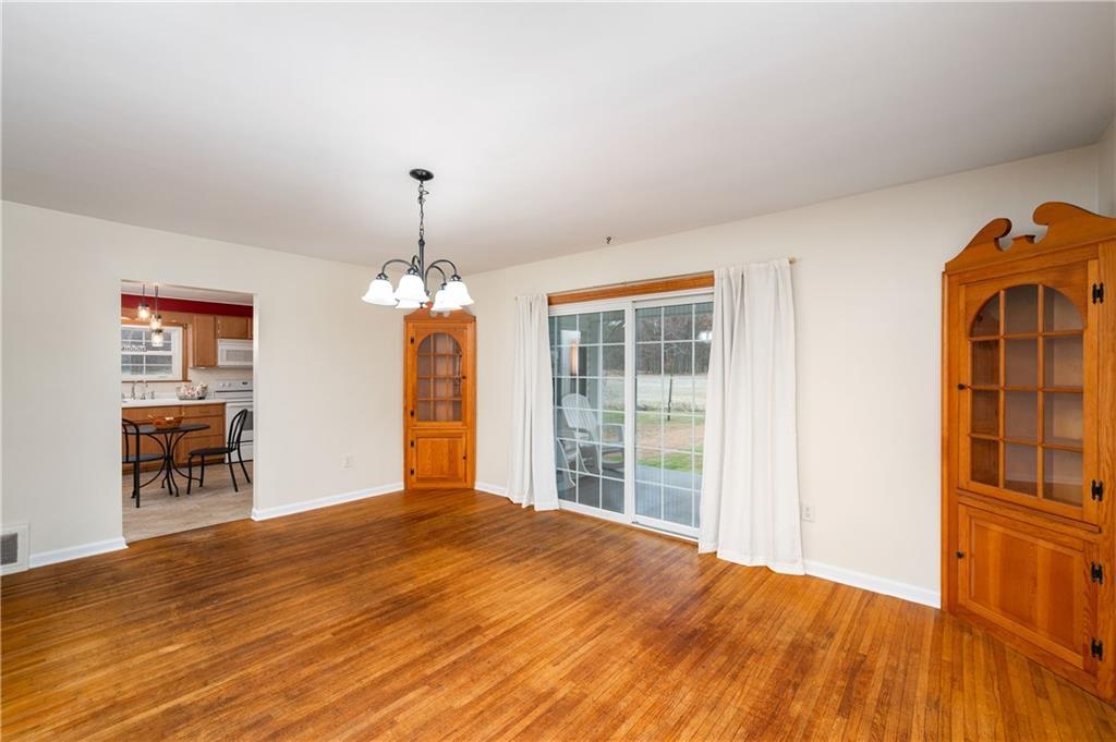 1080 Breakneck Bridge Road Portersville, PA 16051 - Photo 15 of 45 a bedroom with a bed and a window