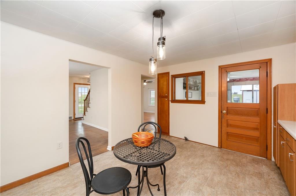 1080 Breakneck Bridge Road Portersville, PA 16051 - Photo 19 of 45 a workspace with furniture and chandelier