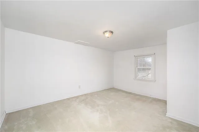 an empty room with a workbench