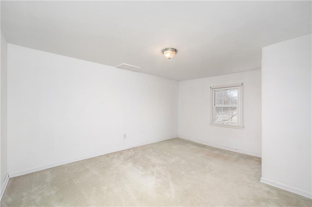 1080 Breakneck Bridge Road Portersville, PA 16051 - Photo 25 of 45 an empty room with a workbench