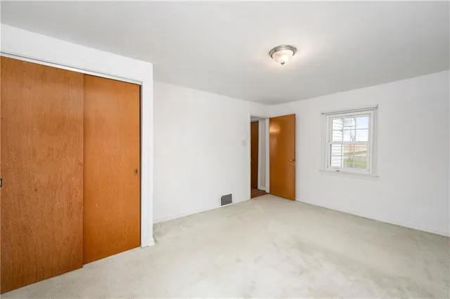 a view of an empty room with window