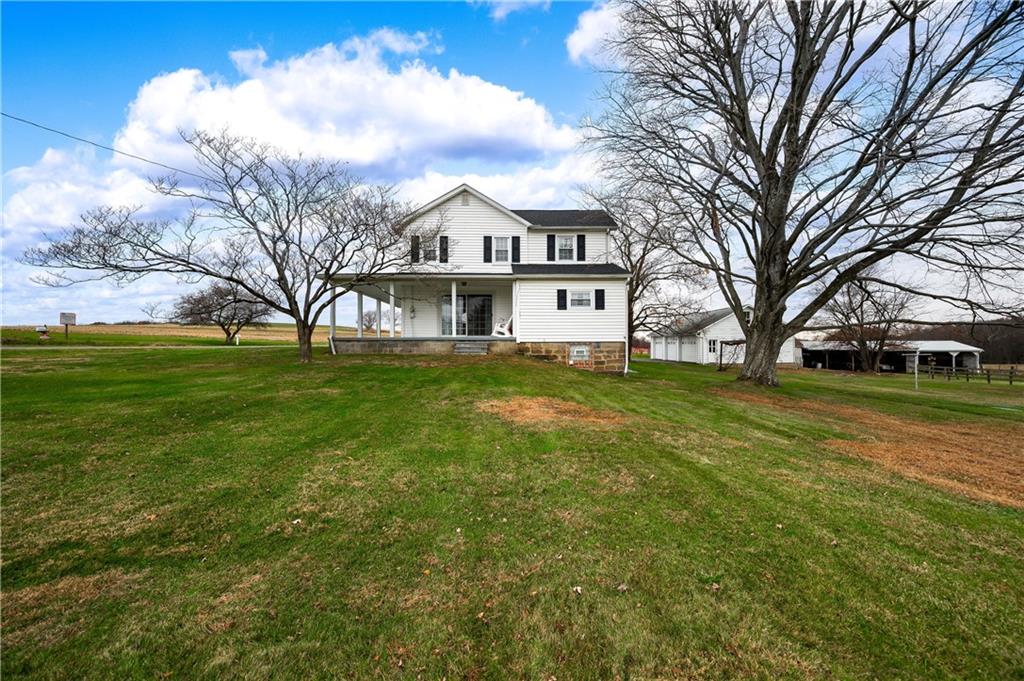 1080 Breakneck Bridge Road Portersville, PA 16051 - Photo 31 of 45 a view of house with yard and sitting area