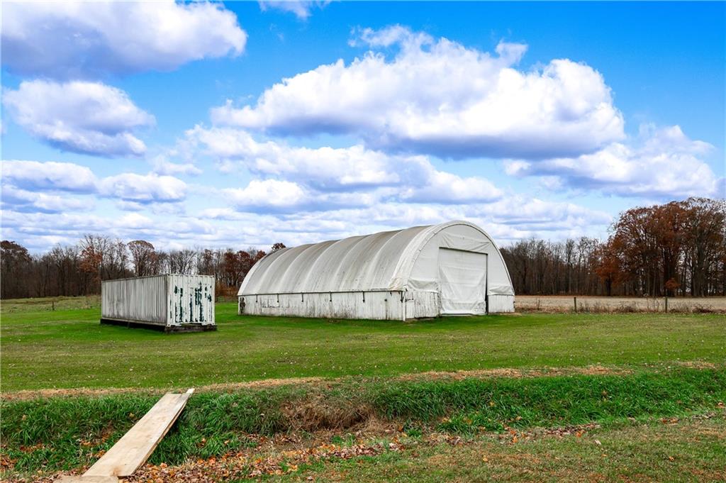 1080 Breakneck Bridge Road Portersville, PA 16051 - Photo 34 of 45 a view of a garden with wooden fence