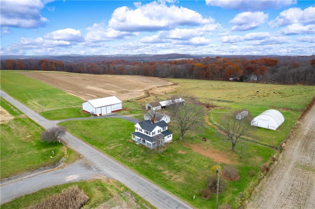 1080 Breakneck Bridge Road Portersville, PA 16051 - Photo 36 of 45 a view of a big yard with an outdoor seating