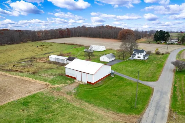 an aerial view of a house with garden