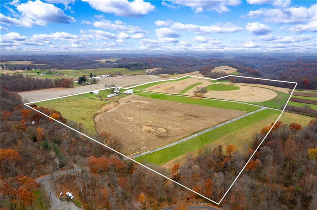 1080 Breakneck Bridge Road Portersville, PA 16051 - Photo 44 of 45 a view of a tennis ground with a nearby beach