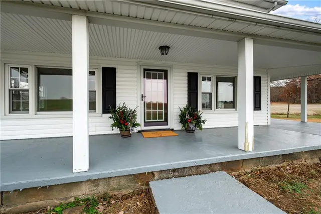 a view of a living room with furniture