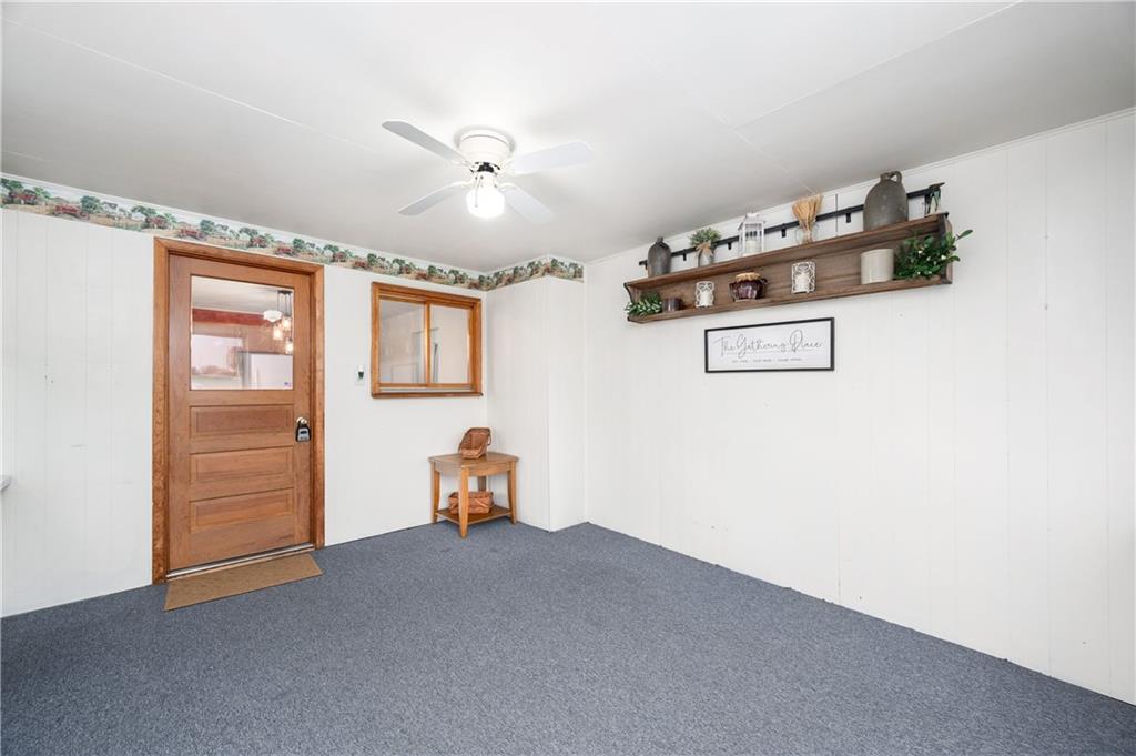 1080 Breakneck Bridge Road Portersville, PA 16051 - Photo 7 of 45 an empty room with windows