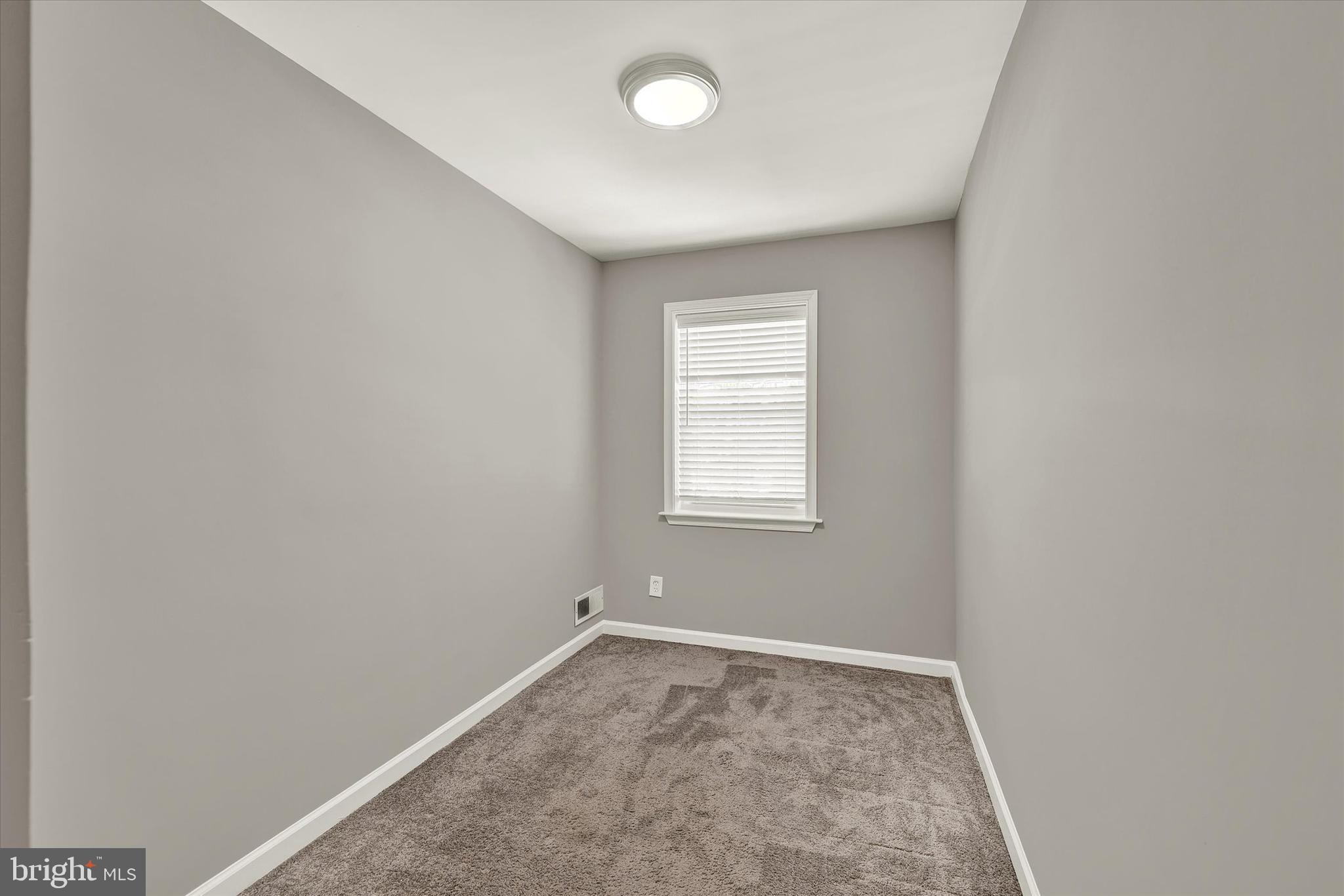 3482 Dunhaven Road Dundalk, MD 21222 - Photo 19 of 33 wooden floor in an empty room