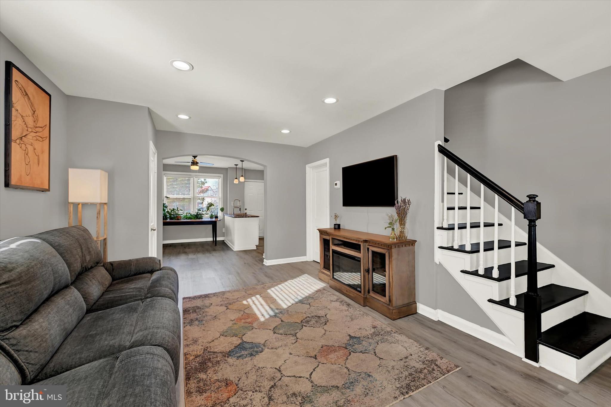 3482 Dunhaven Road Dundalk, MD 21222 - Photo 4 of 33 a living room with furniture and a flat screen tv
