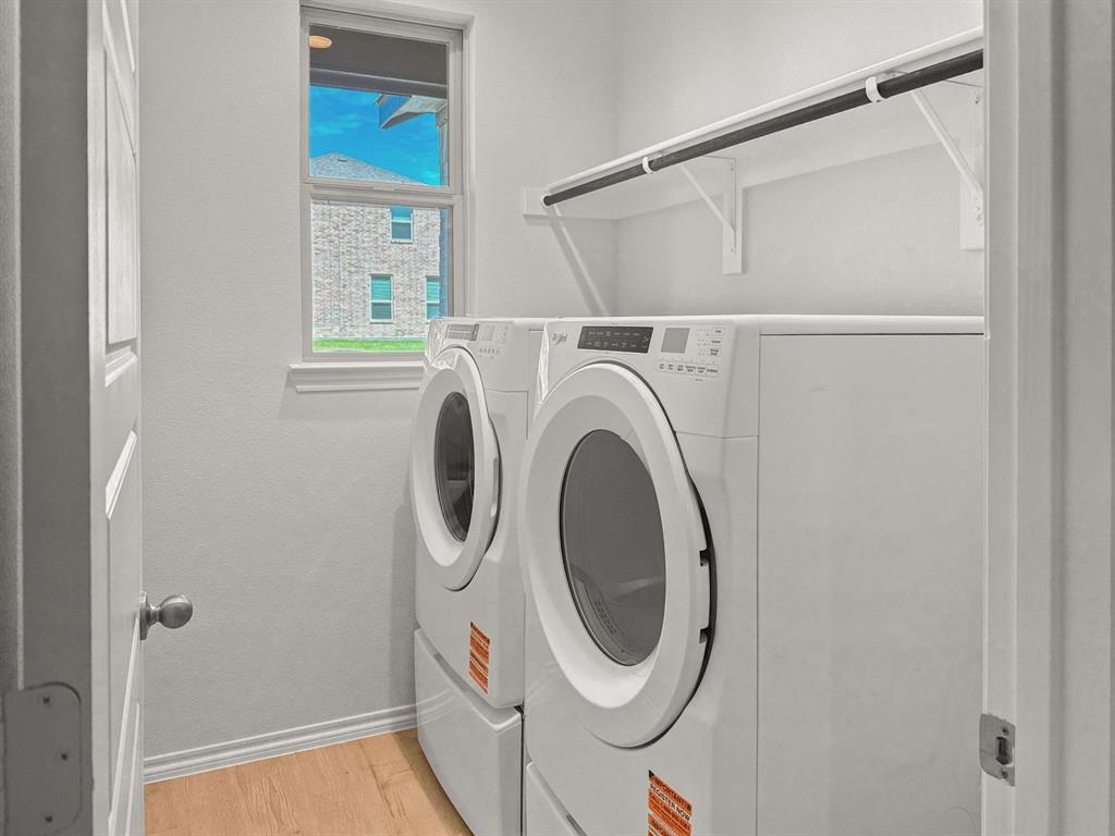 1908 Iris Road Melissa, TX 75454 - Photo 29 of 30 a utility room with dryer and washer