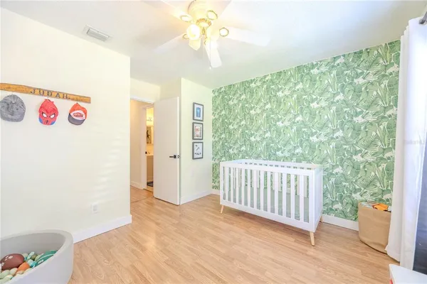 a view of livingroom with window and kitchen view