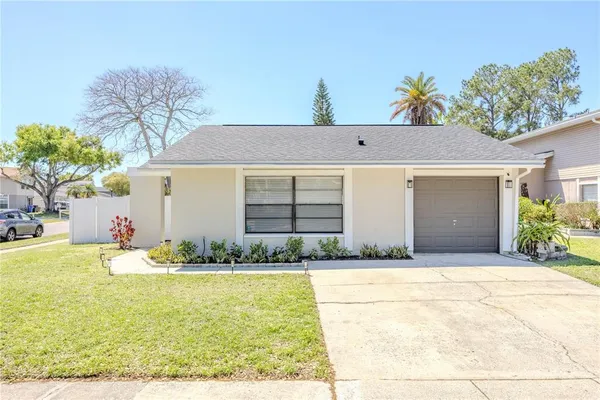 a front view of house with yard