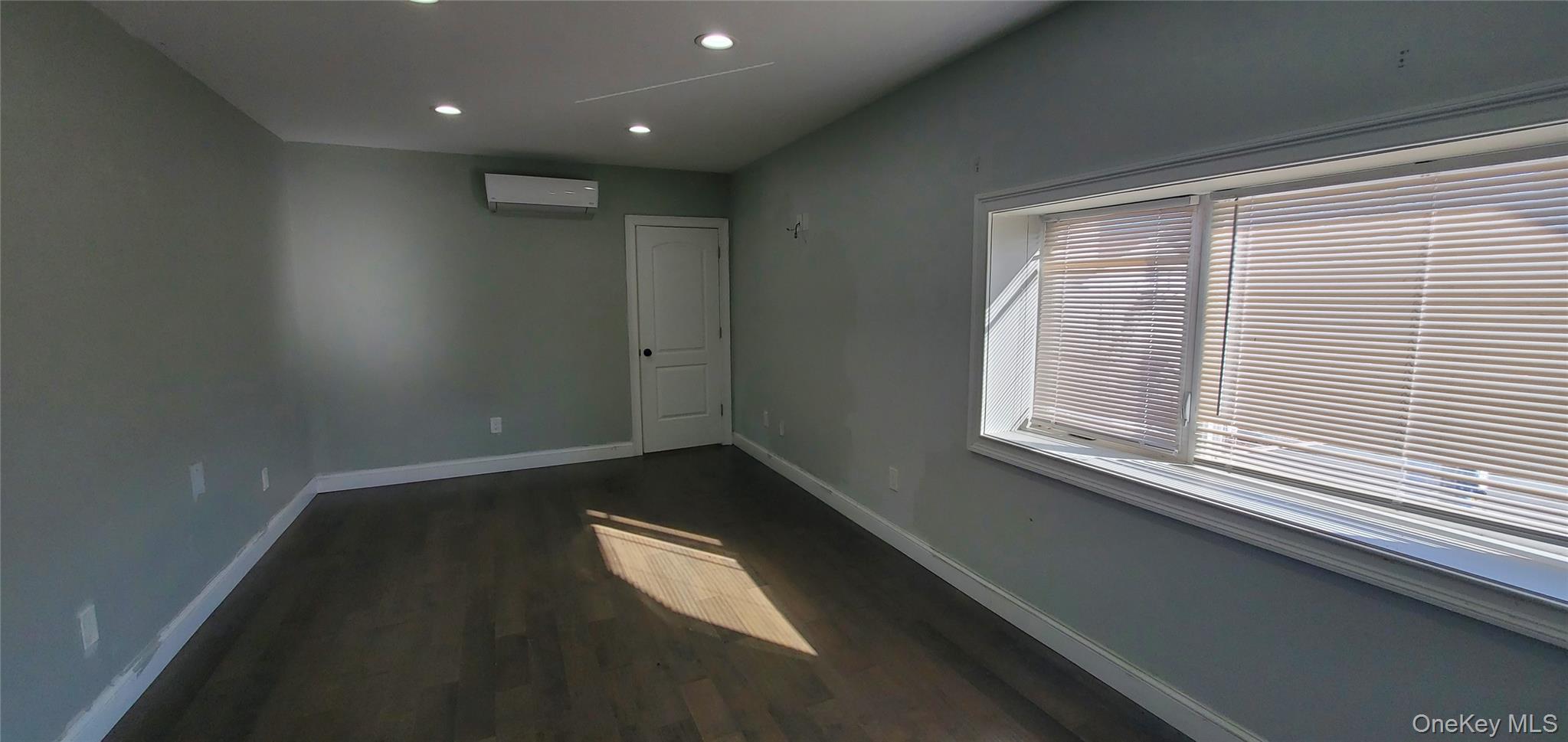 2755 West Main Street, Unit 1 Wappingers Falls, NY 12590 - Photo 11 of 15 a view of an empty room with a window