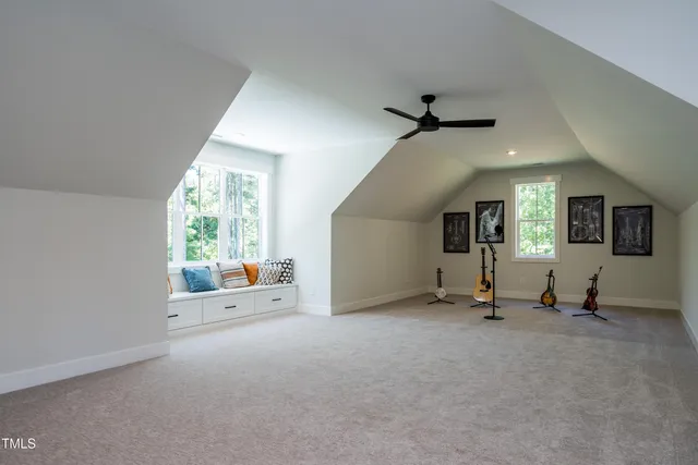 a room with a walk in closet and a window
