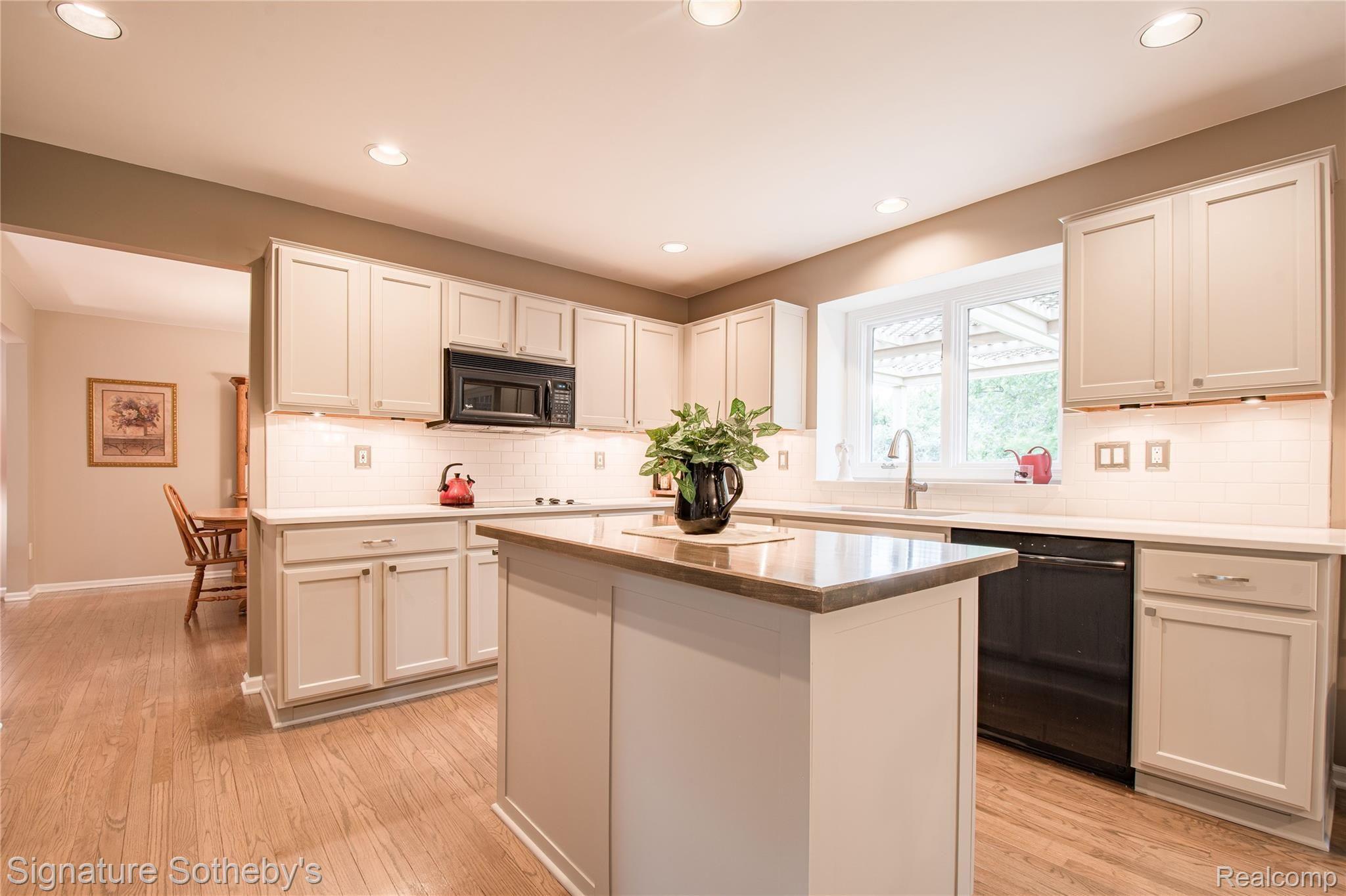 745 West Ridge Court Lake Orion, MI 48359 - Photo 15 of 44 Custom wood topped island