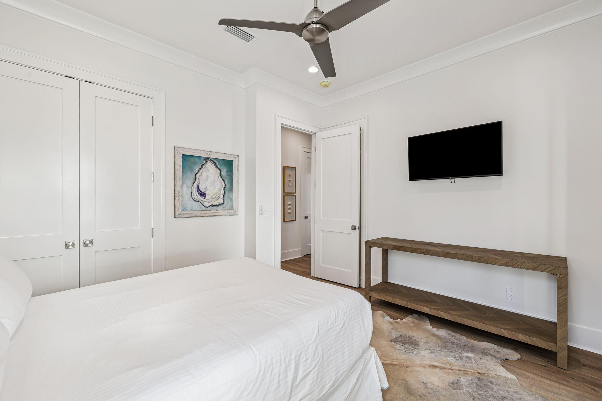 33 Sand Flea Dr Inlet Beach Inlet Beach, FL 32461 - Photo 20 of 56 a bedroom with a bed and a flat screen tv