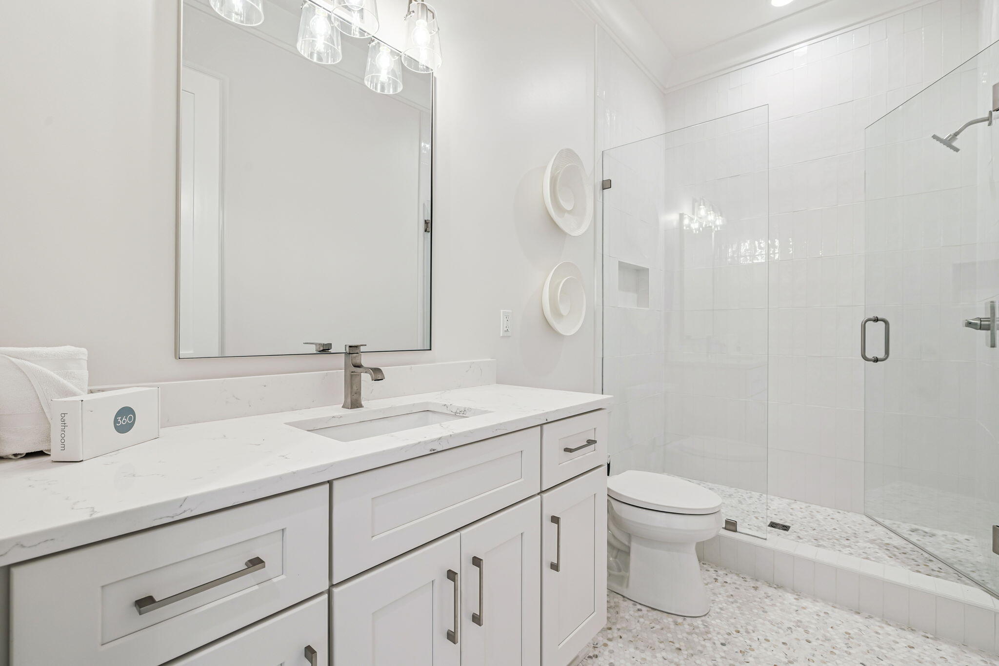 33 Sand Flea Dr Inlet Beach Inlet Beach, FL 32461 - Photo 21 of 56 a bathroom with a sink a toilet and a mirror
