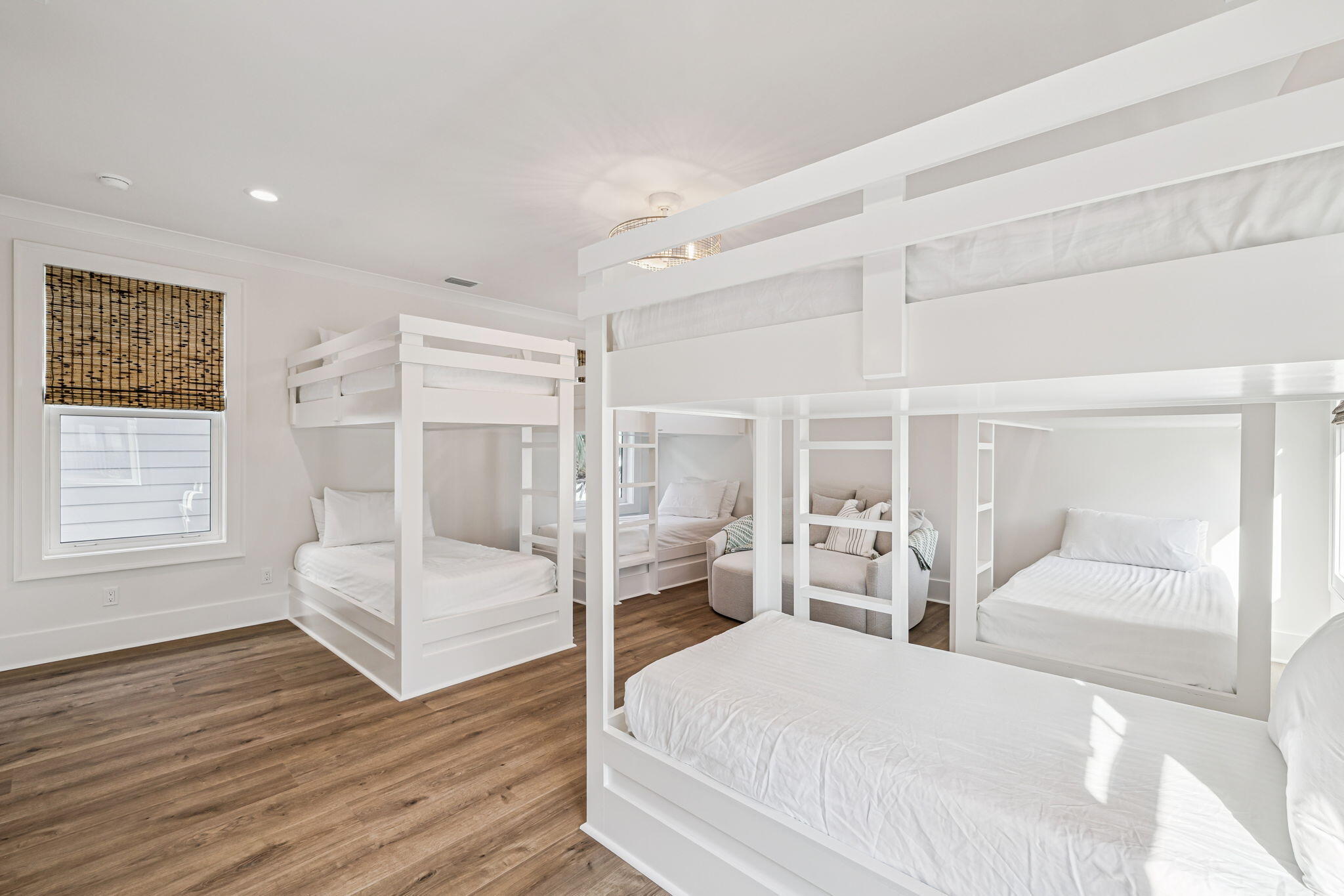 33 Sand Flea Dr Inlet Beach Inlet Beach, FL 32461 - Photo 23 of 56 a bedroom with a white bed and wooden floor