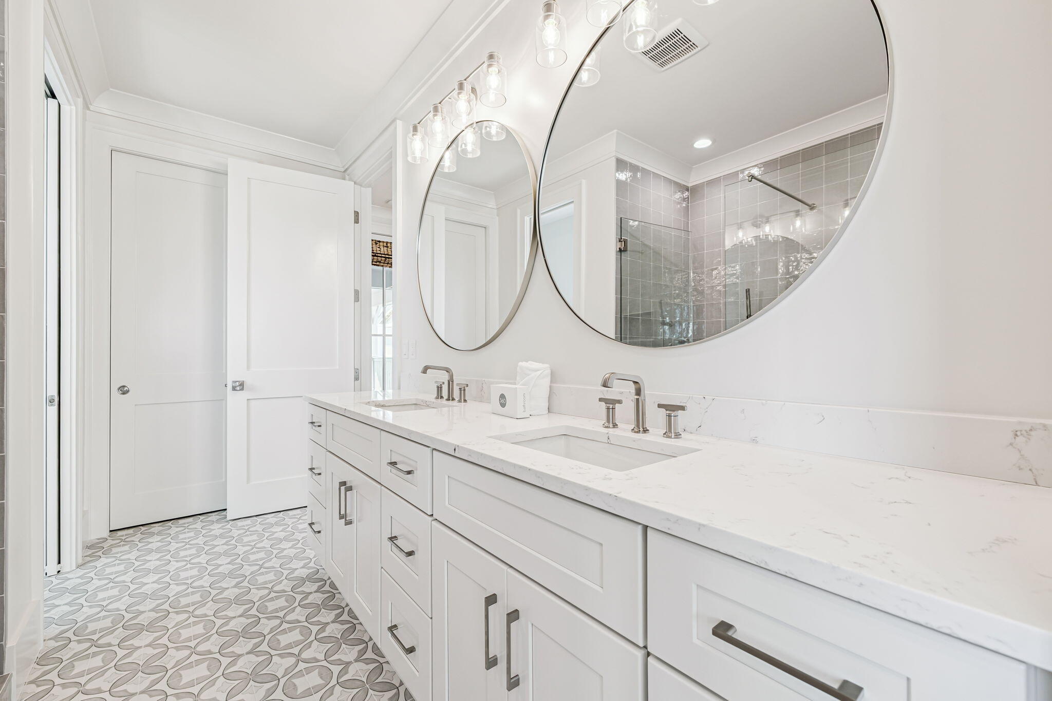 33 Sand Flea Dr Inlet Beach Inlet Beach, FL 32461 - Photo 36 of 56 a bathroom with a double vanity sink and a mirror