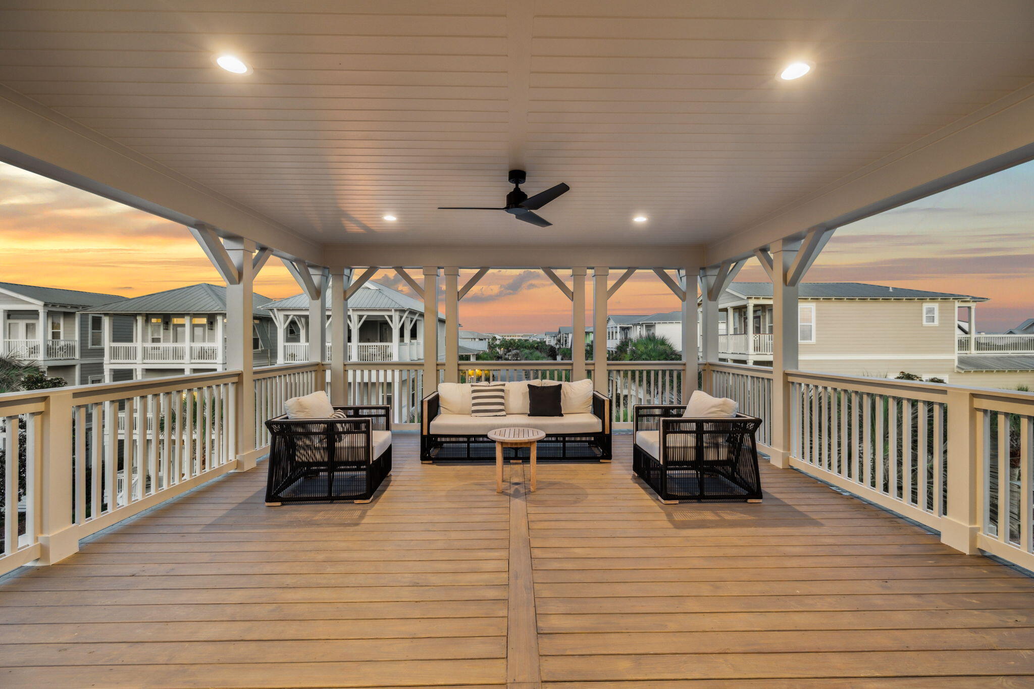 33 Sand Flea Dr Inlet Beach Inlet Beach, FL 32461 - Photo 40 of 56 a living room with patio furniture and a fireplace