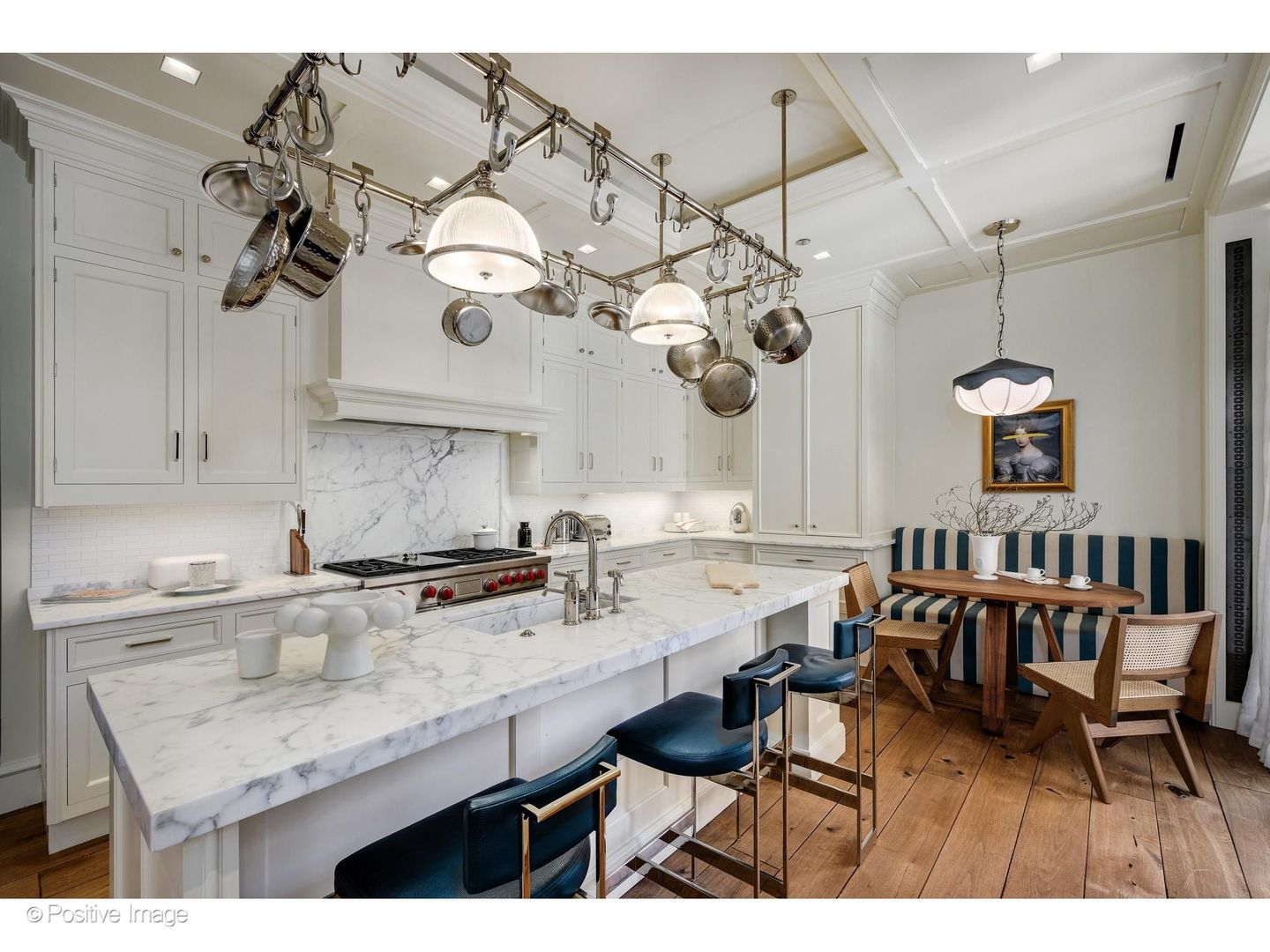 65 East Goethe Street, Unit 4E Chicago, IL 60610 - Photo 20 of 45 a kitchen with a table and chairs in it