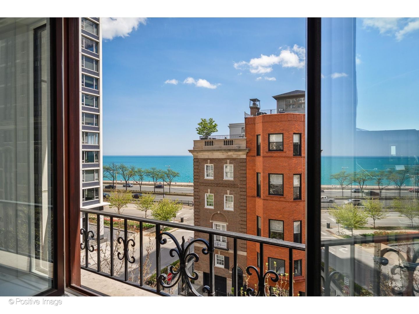 65 East Goethe Street, Unit 4E Chicago, IL 60610 - Photo 24 of 45 a balcony view with an ocean view