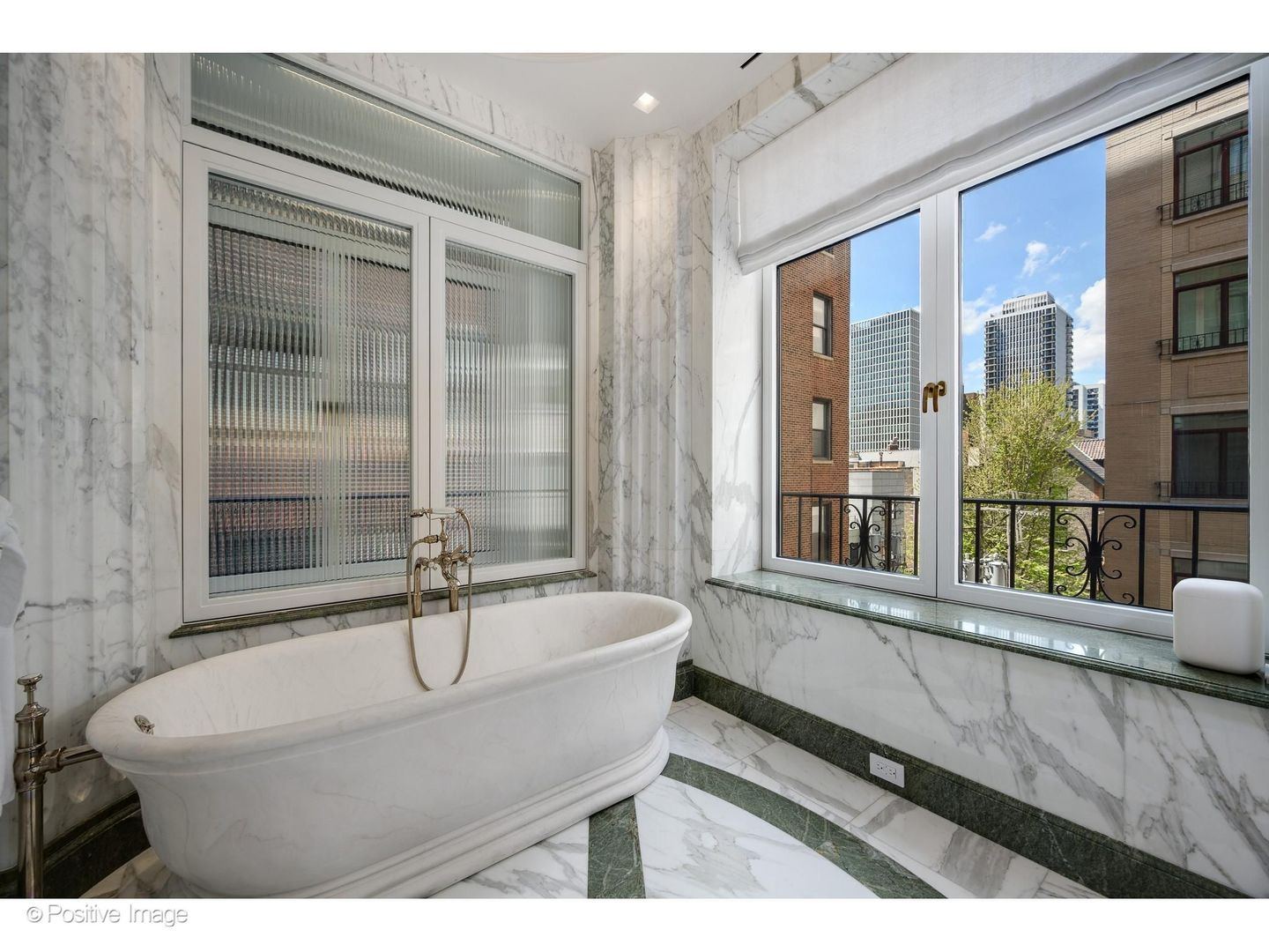 65 East Goethe Street, Unit 4E Chicago, IL 60610 - Photo 37 of 45 a bathroom with a bathtub and a sink