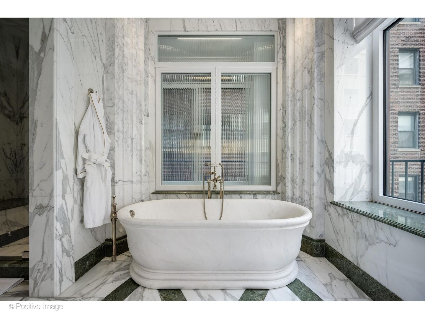 65 East Goethe Street, Unit 4E Chicago, IL 60610 - Photo 38 of 45 a white bath tub sitting next to a window