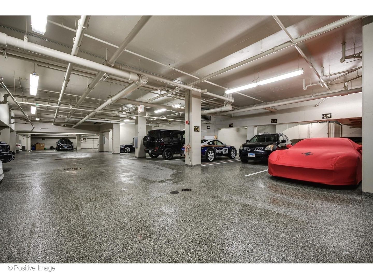 65 East Goethe Street, Unit 4E Chicago, IL 60610 - Photo 44 of 45 a view of cars parked in a parking