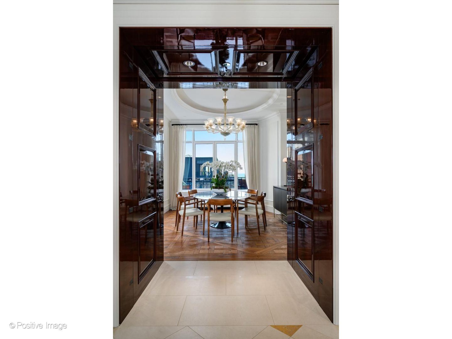 65 East Goethe Street, Unit 4E Chicago, IL 60610 - Photo 6 of 45 a view of a living room with a table and chairs