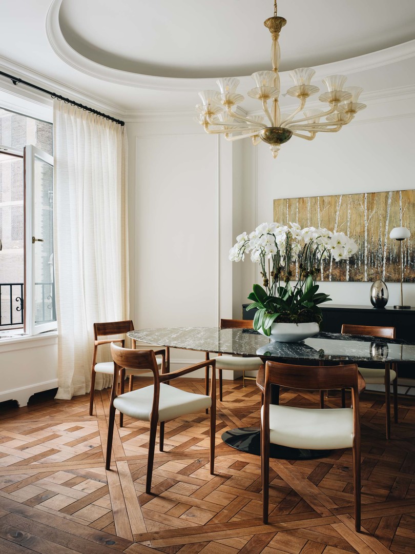65 East Goethe Street, Unit 4E Chicago, IL 60610 - Photo 7 of 45 a view of a dining room with furniture and chandelier