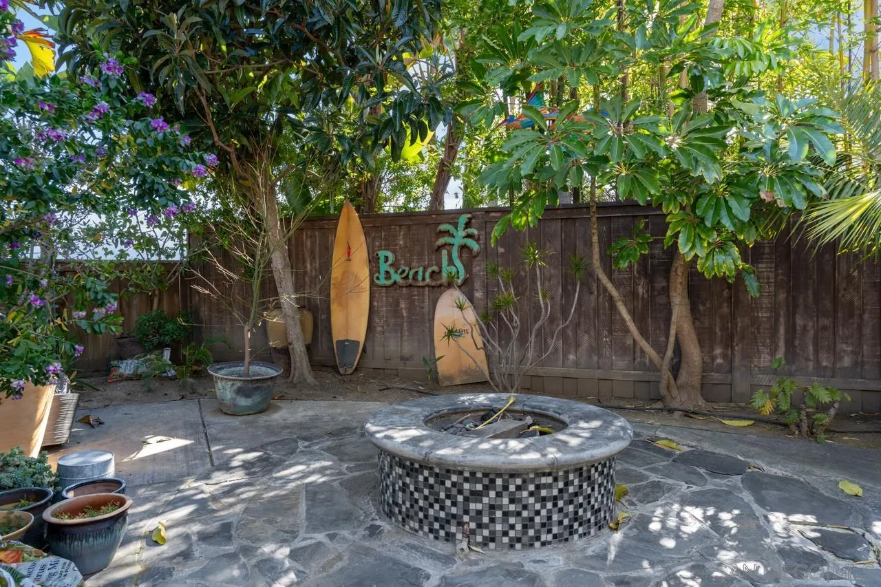 1815 Hawk View Drive Encinitas, CA 92024 - Photo 12 of 51 a wooden bench with some trees