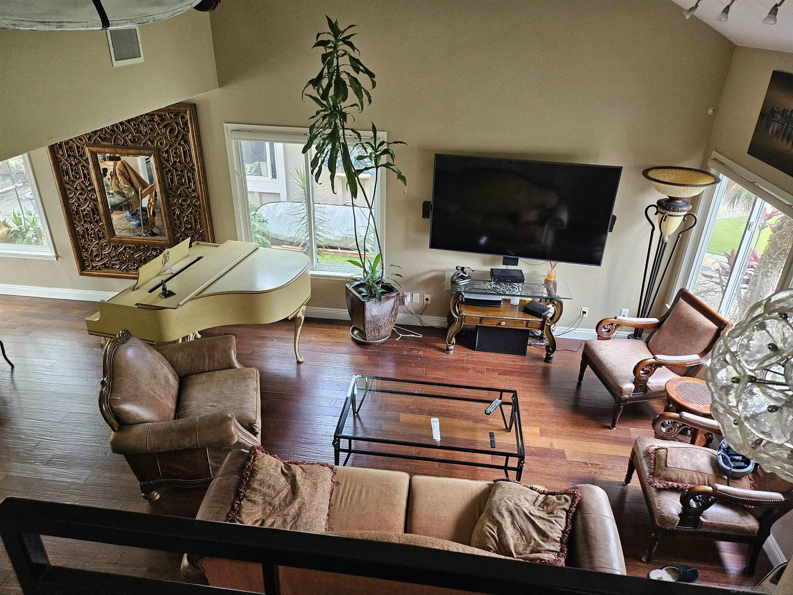 1815 Hawk View Drive Encinitas, CA 92024 - Photo 2 of 51 a living room with furniture and a flat screen tv