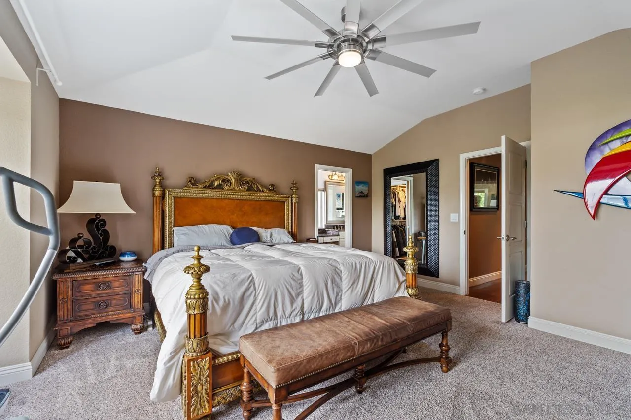 1815 Hawk View Drive Encinitas, CA 92024 - Photo 30 of 51 a bedroom with a bed and wooden floor