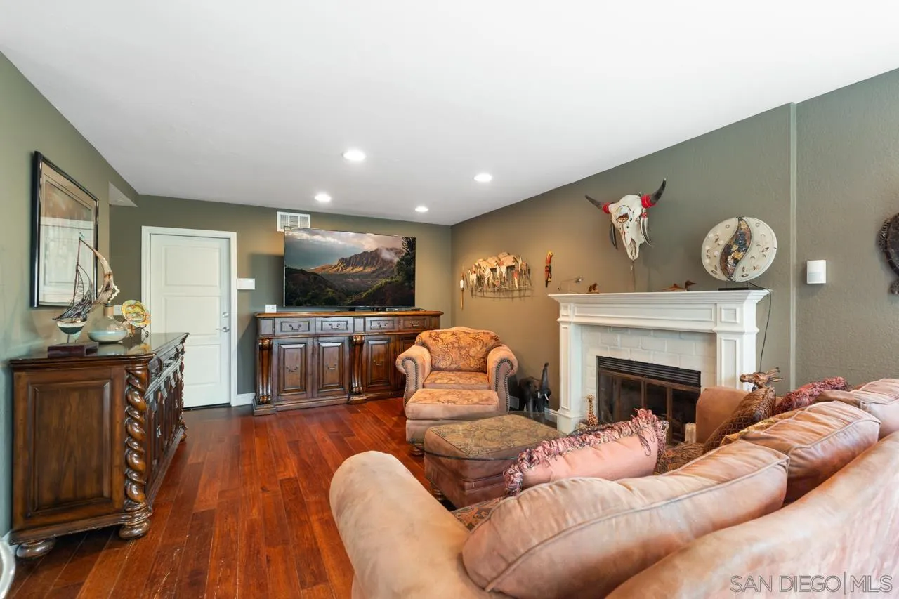 1815 Hawk View Drive Encinitas, CA 92024 - Photo 33 of 51 a living room with furniture and a fireplace