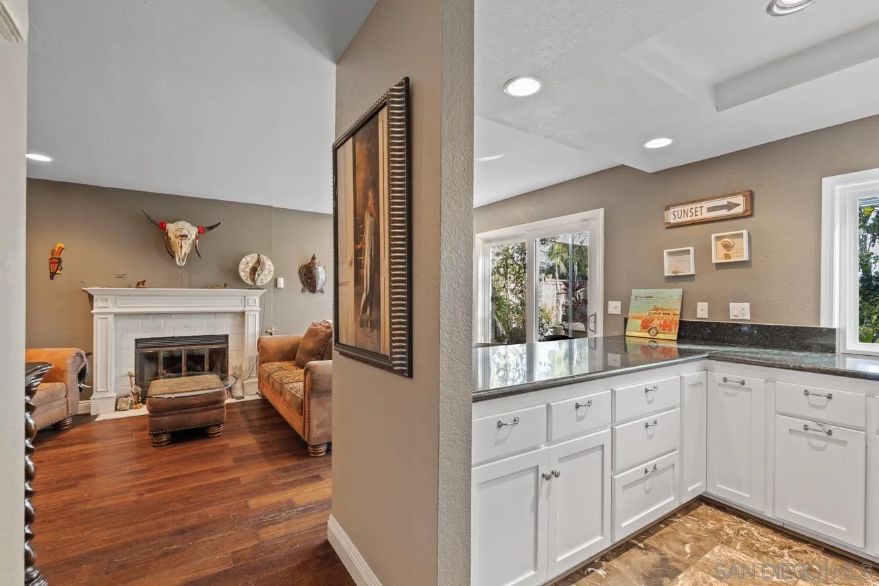 1815 Hawk View Drive Encinitas, CA 92024 - Photo 38 of 51 a living room with furniture and a fireplace