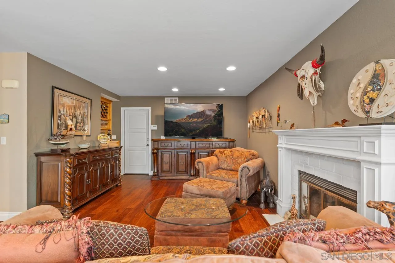 1815 Hawk View Drive Encinitas, CA 92024 - Photo 39 of 51 a living room with furniture and a flat screen tv