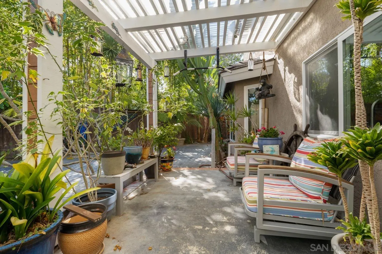 1815 Hawk View Drive Encinitas, CA 92024 - Photo 9 of 51 a backyard of a house with outdoor seating