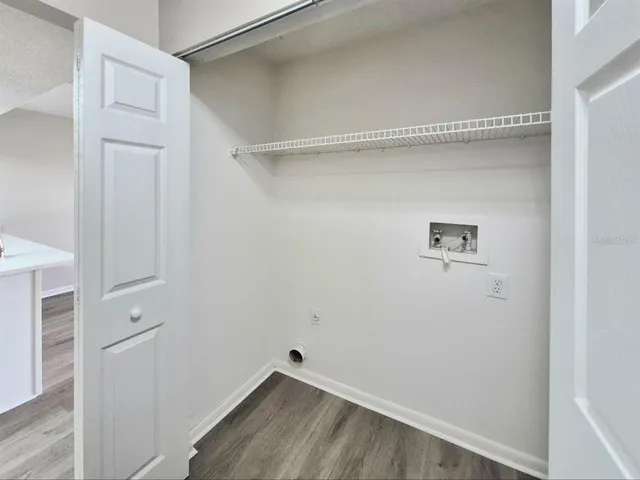 a bathroom with a toilet and a bathtub