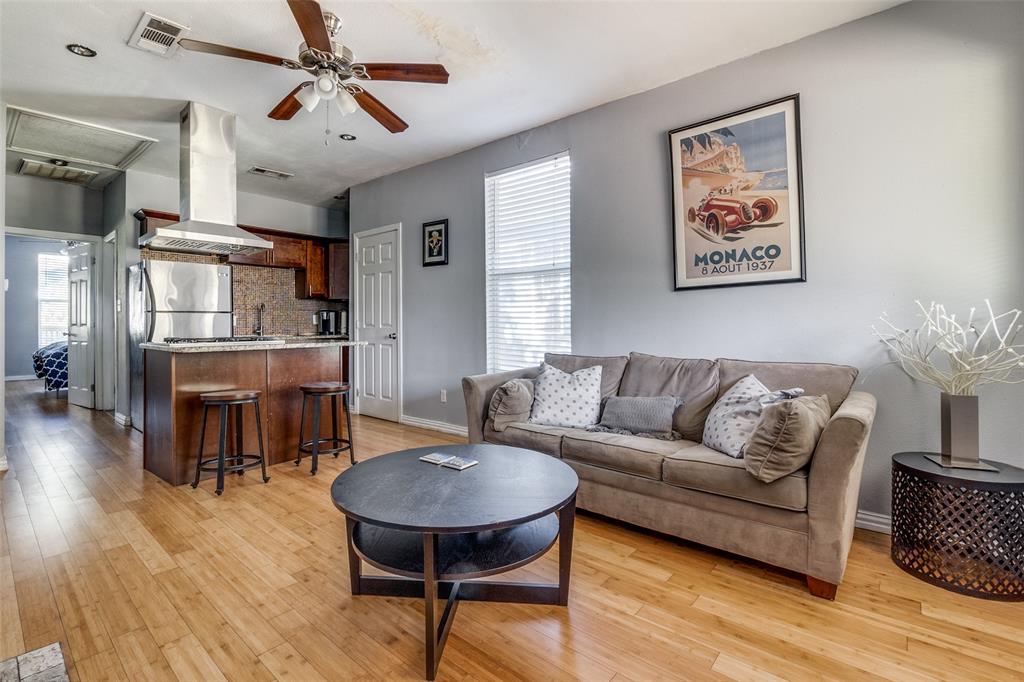617 Haines Avenue Dallas, TX 75208 - Photo 13 of 29 a living room with furniture and wooden floor