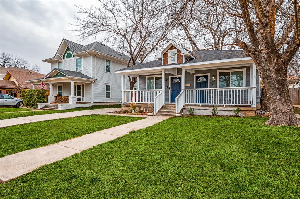 617 Haines Avenue Dallas, TX 75208 - Photo 2 of 29 a front view of a house with a garden