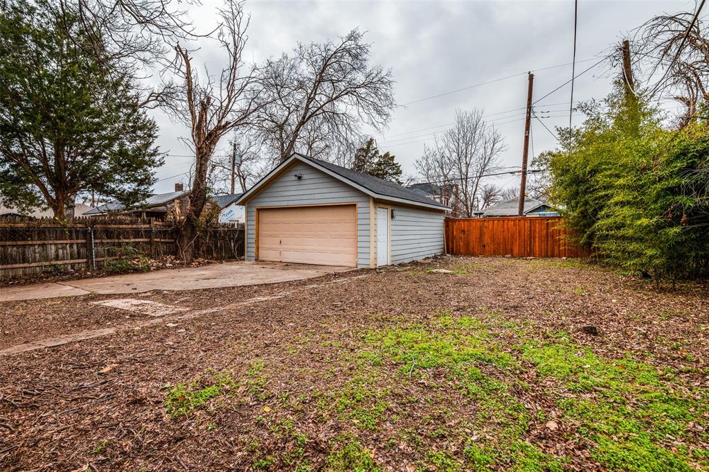 617 Haines Avenue Dallas, TX 75208 - Photo 6 of 29 a house with trees in front of it